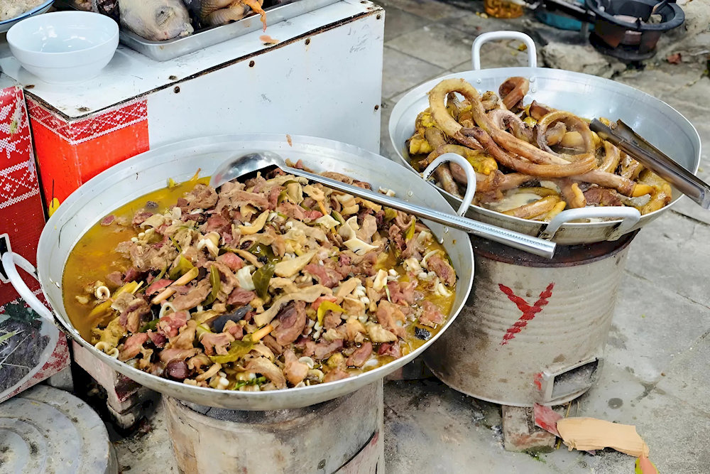 Traditional Northwest Vietnamese cuisine served in an authentic ethnic homestay in Muong Hoa Valley, featuring local specialties and organic ingredients